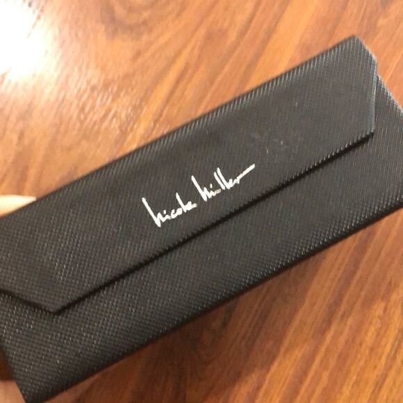 Nicole Miller Black hard triangular eyeglass case. - Picture 1 of 8